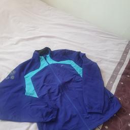 The lightweight, versatile women's Jacket provides wind and water protection and a stay-put fit that lets you focus on your run, not your gear.

the size is more medium to large 

Really comfortable running jacket, only been worn twice in in like new condition, coat £80