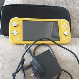 nintendo switch lite in yellow,like new,comes with case,charger and original box. only been played on twice.