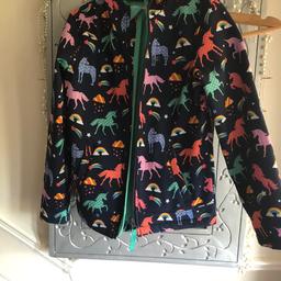 Navy blue lightweight jacket with unicorns and fleece lining in very good condition size 7/8 years £5 collection only Elm Park