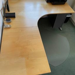 IKEA L shaped corner desk.
The extension can be removed.