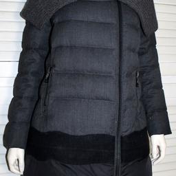 Moncler X Loro Piana OCELOT Down Coat

100% Authentic

With CERTILOGO CODE

Features:
RIRI zip
Wool Collar
Moncler logo at hem

Fabric Specs:
Outer: 100% Wool
Lower Outer Edge: 99% Polyamide/Nylon 1% Polyurethane
Lining: 100% Polyamide/Nylon
Filling: 90% Down 10% Feather

Size : Label show 2 (Moncler Woman's size) which is equal to a:
UK 12
EU / US MEDIUM
FR 40
DE 38
IT 44
“IN VERY GOOD CONDITION!!! Just some light pilling and light signs of wear at lower black band”