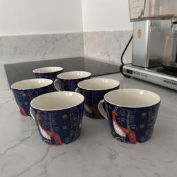 Dark blue Iitala coffe cups, 6 pieces, with animal print on them. Very seldomly used by us and in very nice condition.
