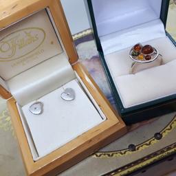 sale . was 25
lovelypair hot diamonds earrings
beautiful vintage size o silver stamped ring with a unique strength naughtiless shell shape . rare unique x
boxes not included .. can add for £2 extra