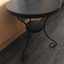 Black side metal table from ikea can deliver local