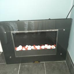 Wall mounted fire great condition with 2 heat settings and one setting for just the flame. Collection only please.