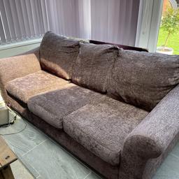 Large 3 seater grey sofa with wooden feet back cushions zip on all working some slight sun discolouration due to it being in my conservatory but not too noticeable comfy sofa