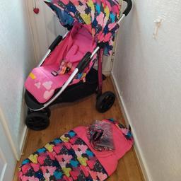 in very good and clean condition suitable from birth ,sturdy and easy to maneuver .
includes matching footmuff that converts to a liner and raincover too .