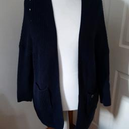 Superdry navy wool knitted long cardigan. In excellent condition. Size xl
For more items please check out my Facebook and Instagram at The Northern Designer Exchange x