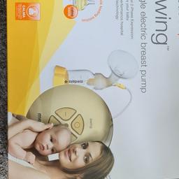 Medela breast pump, without bottles and breast cup.