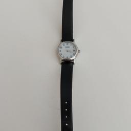 Vintage CITIZEN  Eco Drive  Womens' Watch E011-S049415 HST 
                         band - 22.5 cm long with clasp 
Material:  stainless steel and leather band 
Color: Black and silver 
Condition:  it works!.....no cracks and no broken parts....super dial!....case shows normal slight wear and marks by use