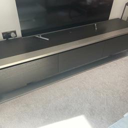 We are selling our chocolate oak veneer stainless steel tv stand. We have had it for just under a year and is in very good condition. It was purchased from Dwell for £549.

Measurements for the unit is 200cm width height is 45cm and depth is 45cm.

We are based in Chigwell IG7.

Can be bought as a set with the Dwell storage coffee table that I have advertised

Please no silly offers, but we would open to reasonable offers.