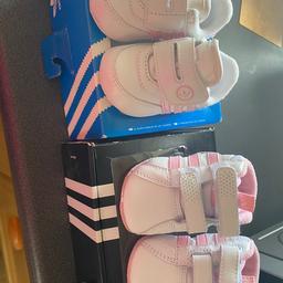 2 pairs of brand new girls Adidas Newborn Trainers. Never used in original boxes