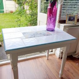 Refurbished Pine Kitchen Table White tiled top with marazzi tile centre.
27ins W x 36ins L x 29ins H
Collect from Wallington SM6. Local Delivery possible for petrol
(Note table is heavy. May need 2 people to transport safely)