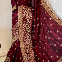 Size 10/12
Beautiful heavy embroidery work saree very long length👍Lots of pleats can be done.Blouse standerd size. colour is very Rare - Dark Maroon