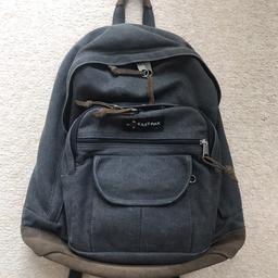 Grey backpack with suede