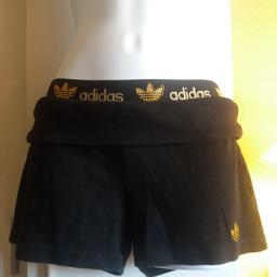 adidas shorts says medium but fit small, lettering on the back is a bit cracked