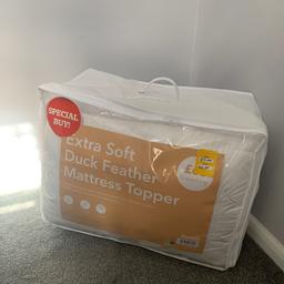 extra soft duck feather mattress topper 
‘filled with extra soft refined feather for unlimited comfort’
100% cotton cover
elasticated straps 
Superking
Original sell price = £65