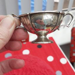 vintage minature sterling silver Trophy
fully Halmarked,
sweet little vintage Trophy
approximately 24 grams ,
will need a good polish, as it has been stored away for some years. 
I do have it listed on other sides
COLLECTION ONLY
SORRY NO POSTING
NO OFFERS,
REGARDS