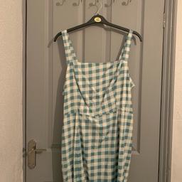 Sexy size 20 summer dress (can however be styled for all seasons). Never worn due to not fitting.

The back has beautiful mini ruffle serial as depicted.

Comes from corona, pet and smoke free home.

Please feel free to make offers and see other items as I want everything gone.

Collection only