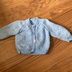 New
Hand knitted 
Baby cardigan 
Pale blue with flecks 
Apple buttons 
3-6 months 

Can be collected or sent for postage fees