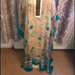 New Kaftan it’s free size.
Embroidery o the bottom with lining.it’s designer Kaftan.
Pick up from bl9 or can post.