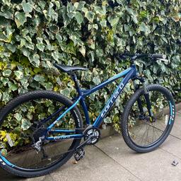 bike is as pictured 
29” wheels no buckles 
good tred still 
18” frame 
front left shifter which changes front gears has crack in it so will need new one £10 offline 

apart from that good bike few minor marks as expected of used bike