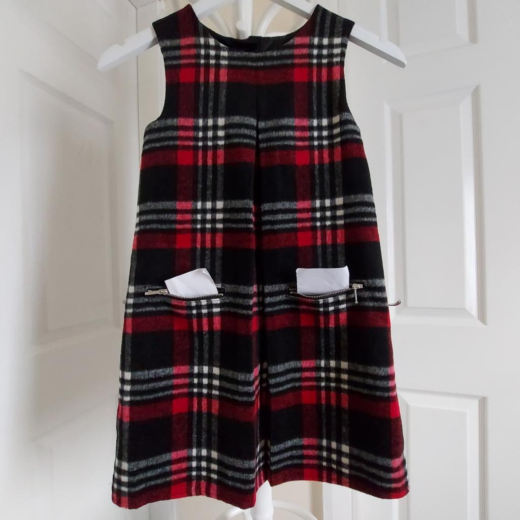 Dress St.Bernard For”

Dunnes Stores“Check Pinny

 Red Mix Colour

New With Tags

Actual size: cm

Length: 69 cm from shoulders front

Length: 68 cm from shoulders back

Length: 52 cm from armpit side

Shoulder width: 29 cm

Volume Hands: 30 cm

Breast Volume: 67 cm - 68 cm- actual size,
To Fit Chest: 27 IN (UK)
Eur 68 cm - on the label.

Volume Waist: 75 cm – 76 cm

Volume Hips: 83 cm – 85 cm

Age: 10 Years

64 % Polyester
20 % Acrylic
11 % Viscose
 2 % Wool
 2 % Polyamide
 1 % Cotton

Lining: 100 % Polyester