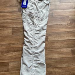 Brand new with original labels. Berghaus walking trousers size 16 (with 31”leg.) Beige, 100% polyamide, 2 main front pockets, 2 zip rear pockets, 2 cargo pockets, removable web belt, breathable, quick drying, legs roll up to make 3/4 trousers if required. UPF 50+ sun protection built in. Collection from Bacton IP14 4NT or if you willing to cover postage costs I can post.