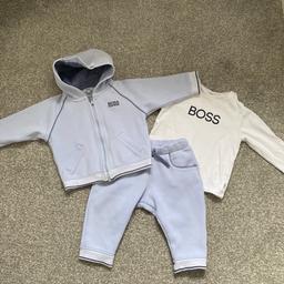 Lovely boys Hugo boss tracksuit 12 months more like 6-9 months 
Really good condition