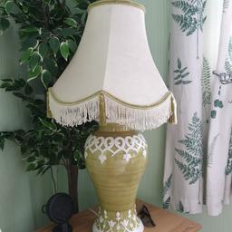 A TABLE LAMP IN PERFECT CONDITION GREEN AND CREAM SELLING DUE TO DOWN SIZES IN