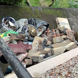 Someone to put all this rubble/bricks etc in skip on drive. Too heavy for me. Needed ASAP tho this evening if possible. Just let me know what you’d charge. Thanks