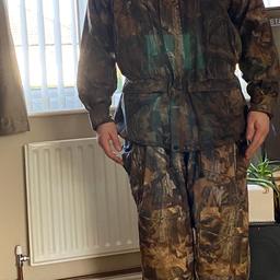 As above waterproof camo full length jacket with hood and matching bib and brace size medium used once
