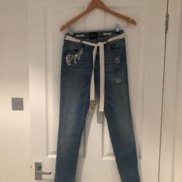 I’m selling here a fabulous designer pair of TWIN SET SKINNY ADELE Jeans with Diamanté’s on the right front pocket & embellished belt. Size 28 but these come up small so would suit a UK size 8. Heart shaped button. In excellent condition. Only selling as a bit small for me.
Similar jeans sold for over £100.
Will post 1st Class Signed For.
Any questions please ask.