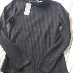 Brand new Black ribbed high neck long sleeved top by Principles
Size 10