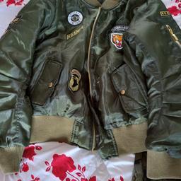 Full complete Military fancy dress outfit. Worn once. 2 Jackets, 2 T-shirts, dog tags + leggings. Bargain. Please check out my other items thanks.