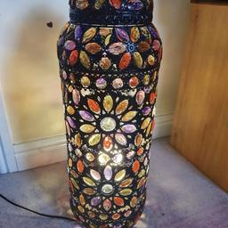 Moroccan Jewel lamp
excellent condition like new
looks stunning in the evening and gives a real cosy look to any room its placed in

check out my other items