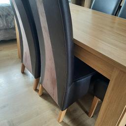 Oak table measurements 5.5 foot long by 3 foot wide. 6 high backed brown leather and suede chairs. excellent condition, slight mark to one chair as seen on photos.
from smoke free home
buyer to collect from long duckmanton s44