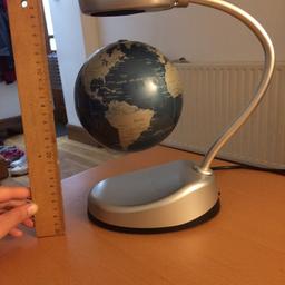 Magnetic globe, when plugged in the globe can ‘float’ and spin in midair. Happy to send you a video of it in action. Weighs 2kg including the power pack, collect from Kingston KT1 or pay postage.