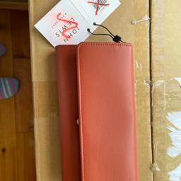 Tan in colour leather purse from JL.