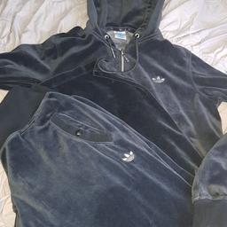 Velour Adidas original's tracksuit
flared leg
size 14
worn a few times
perfect condition