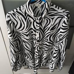 Woman’s river island blouse size 16. From smoke pet free home can drop of or post for extra