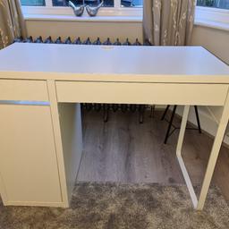 white ikea Desk in good condition. missing back tiny panel as we used that area to clamp the arms for the computer screen. it does not affect its use. 