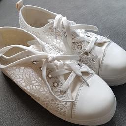 White chunky trainers sz 5. Lace design cut out.  Hardly worn..
Collect from Lowestoft NR32 4HG Or can deliver locally