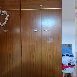 2 brown wood wardrobes solid excellent condition on wheels so easy to move need the space so quick sale please £20 for both must collect

dims: h73 x w30 x d20.5 inch