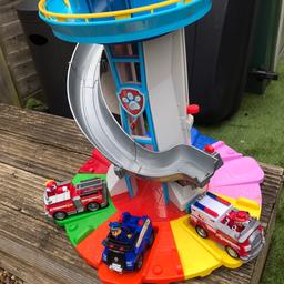 Paw patrol look out tower with 3 vehicles and pups in good condition sounds all work.