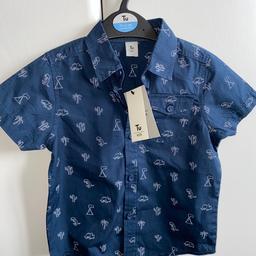 Blue shirt sleeved shirt. Aged 1.5 - 2 years. Smoke and pet free home.