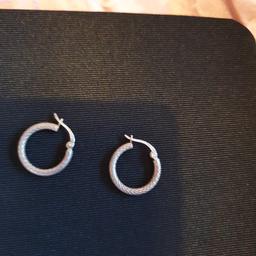 lovely silver earrings..I have more if you are interested..