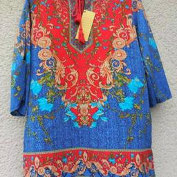 ✔New with a label, a beautiful designer tunic, bright colors great for summer
 ✔The tunic measures from one armpit to the other 50cm, length is 76cm, not lined and is slightly stretchy, the sleeves are half
 ✔for the beach or as a casual summer dress
 ✔Lightweight, attractive, great to wear