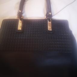 Black handbag. New.. Lovely design