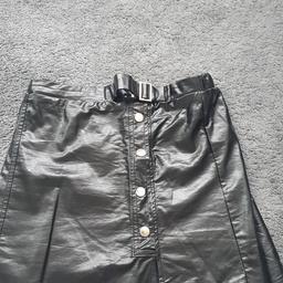 girls leather look skirt.
age 11years